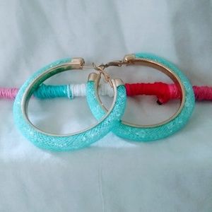 Turquoise blue mesh earrings filled with crystals